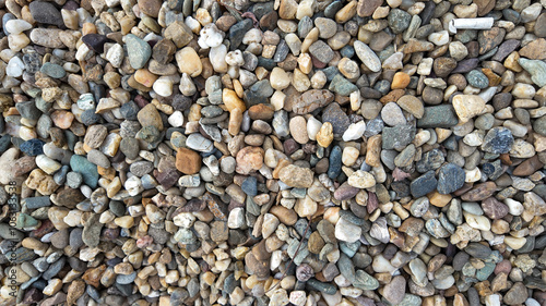 Close-up of a colorful pebble stone arrangement, perfect for concepts related to nature, texture, and landscaping projects