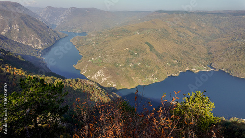 Scenic view of the Drina River canyon during autumn, illustrating the natural beauty and tranquility of Serbia's landscapes photo