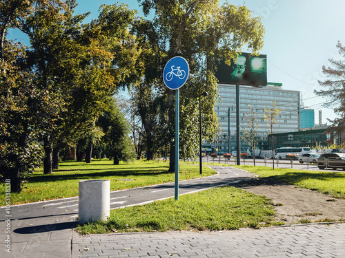 Bicycle sign in the park area. Bicycle lane in city area.