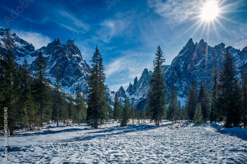 Dolomites in winter. Val Fiscalina, between peaks, larch forests, mountain pines and warm huts. photo