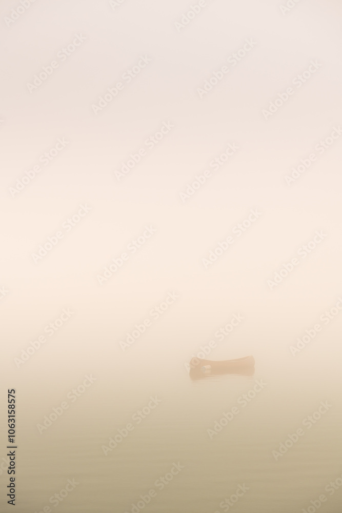 Serene Wooden Boat Floating on a Foggy Morning Lake Scene Serene Wooden Boat Floating on a Foggy Morning Lake Scene
