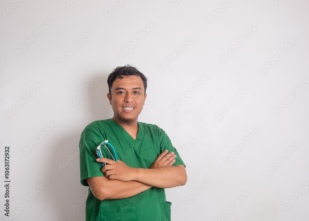 coronavirus disease, health worker concept. Professional and handsome Asian doctor, crossed arms and smiling holding stethoscope, white background coronavirus disease, health worker concept. Professional and handsome Asian doctor, crossed arms and smiling holding stethoscope, white background