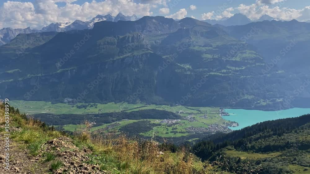 View from Eiseesattel on High Alps mountains and valley with lake, Switzerland View from Eiseesattel on High Alps mountains and valley with lake, Switzerland