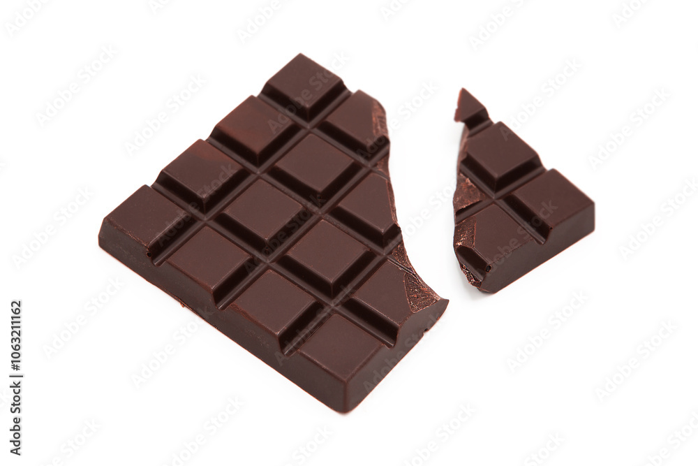 Broken bar of delicious dark chocolate isolated on white background. Classic organic natural black chocolate. Cocoa bean products. Broken bar of delicious dark chocolate isolated on white background. Classic organic natural black chocolate. Cocoa bean products.