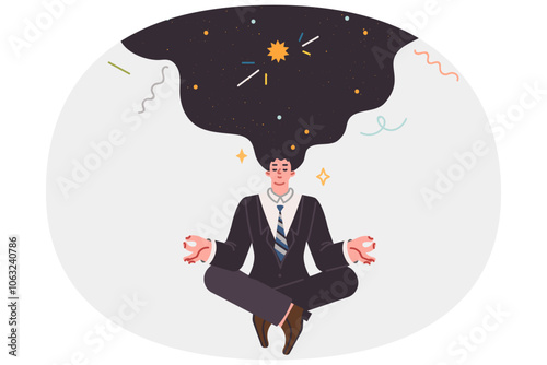 Meditating business man doing yoga thinking about space and trying to get signal from universe