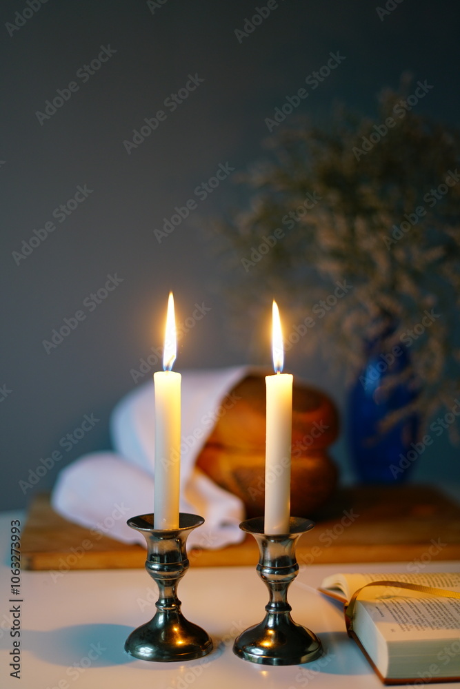 vertical photo Shabbat or Sabbath kiddush ceremony composition with a traditional sweet fresh loaf of challah bread, glass of red kosher wine and candles on a vintage wood table with copy space vertical photo Shabbat or Sabbath kiddush ceremony composition with a traditional sweet fresh loaf of challah bread, glass of red kosher wine and candles on a vintage wood table with copy space