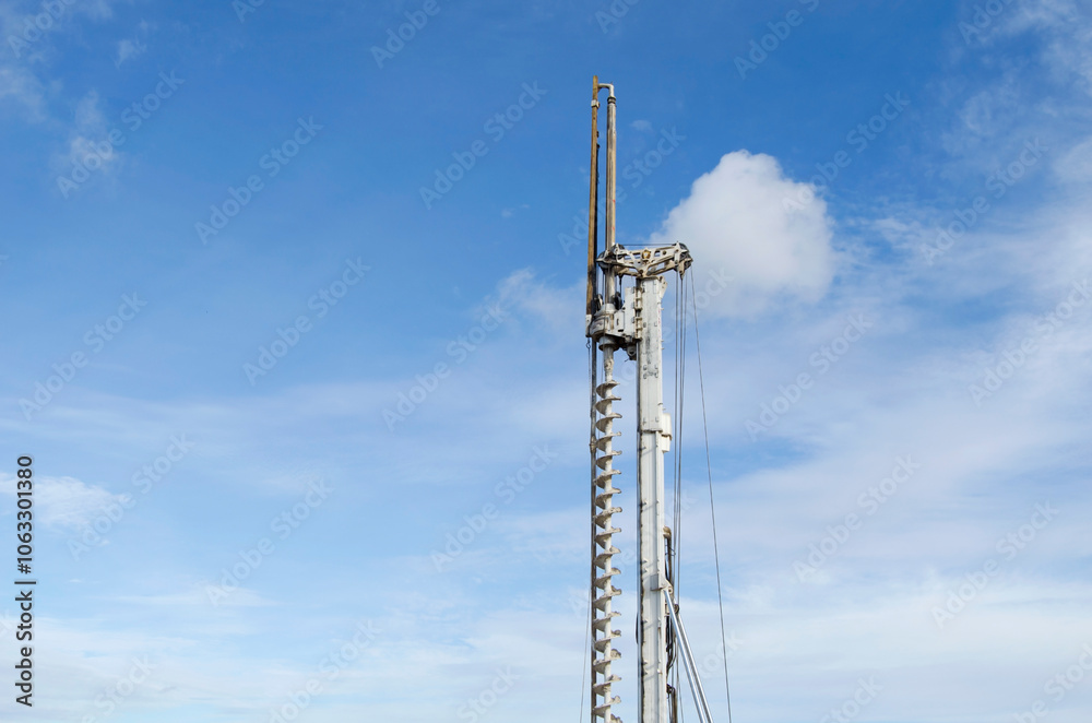 Building activity on contruction site.Drilling machine.Wind turbine construction.