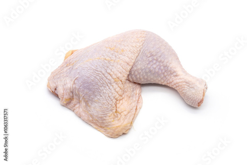 Fresh meat ingredients. One Raw chicken leg drumsticks isolated on white background. photo