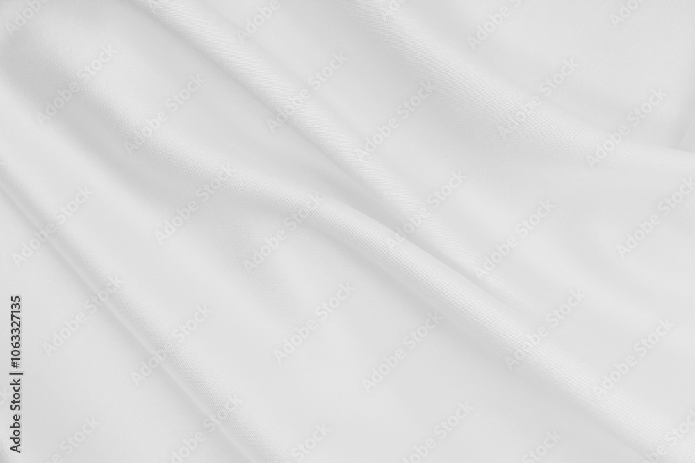 Smooth elegant white silk or satin luxury cloth texture as wedding background. Luxurious background design Smooth elegant white silk or satin luxury cloth texture as wedding background. Luxurious background design