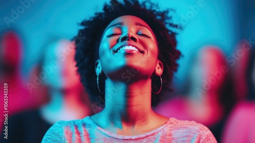 A group of congregants singing along to worship songs during a live streamed church service feeling a deep sense of connection and community through the shared spiritual experience photo