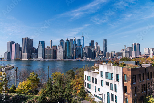 Brooklyn, New York, USA – October 28, 2024: View of lower Manhattan and the Brooklyn Bridge as seen from the promenade in Brooklyn, New York, USA.