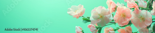 A vibrant spring banner featuring pastel and white blossoms on a teal background, perfect for seasonal sales and celebrations. Copy space.  photo