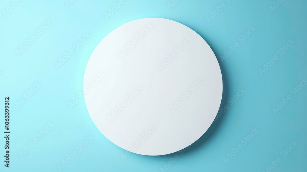 A minimalistic round mirror against a light blue wall, emphasizing simplicity and design. A minimalistic round mirror against a light blue wall, emphasizing simplicity and design.