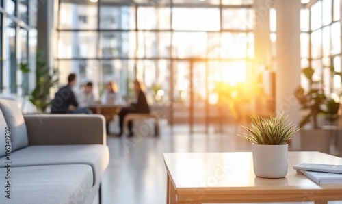 Modern office interior with a meeting area and natural light.