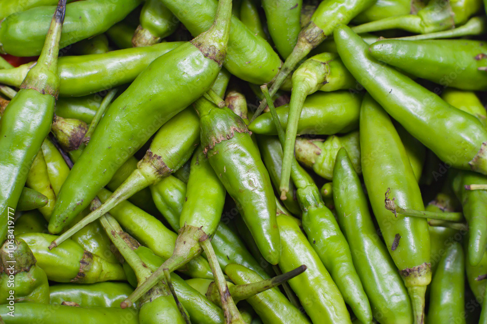 Abstract background of green chili peppers close up Abstract background of green chili peppers close up