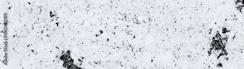 White Surface with Black Spots and Patches photo