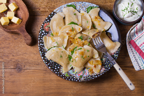 Dumplings filled with ground meat. Varenyky, vareniki, pierogi, pyrohy - dumplings with filling. View from above, top studio shot