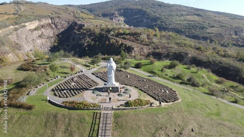 Drone footage of the Serene Hungarian Landscape Surrounding the Large Jesus Statue in the Hills Around Tokaj, Hungary. photo