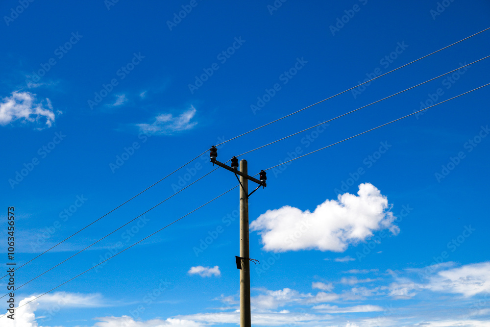 an electric pole in sunny weather an electric pole in sunny weather