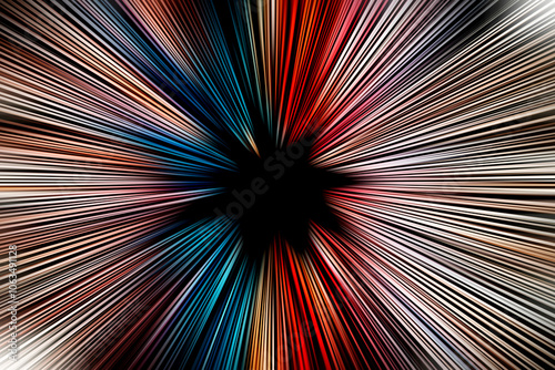 Abstract radial zoom blur surface of in blue, orange and red tones on a black background. Spectacular background with radial, radiating, converging lines.