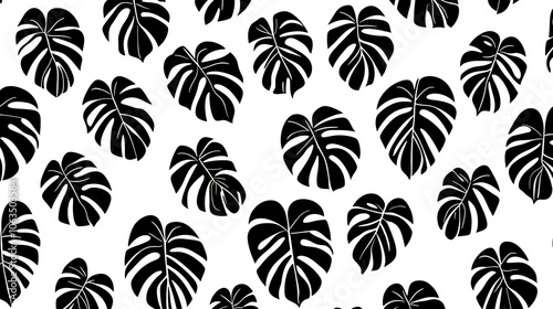 Bold leaf silhouette pattern in black and white, capturing a tropical, modern aesthetic for impactful design.