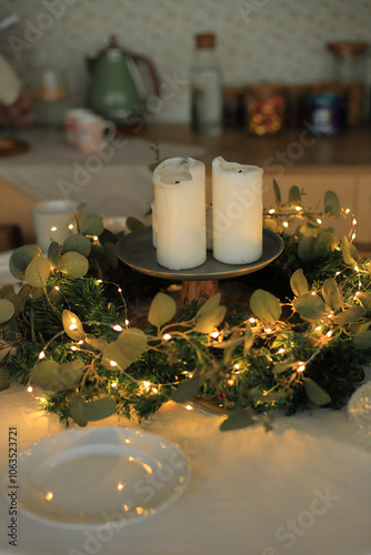 This enchanting Christmas table setting captures the warmth and joy of the holiday season. Adorned with twinkling fairy lights, elegant dinnerware, and seasonal decorations, the table is a perfect