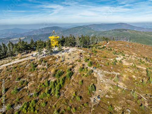 Aerial drone view of Ram Mountain.Observation tower on the top of the mountain. Autumn in the Beskid Mountains.Barania mountain domed  in Silesian Beskids. Barania hill  Ram Mountain nature reserve. photo