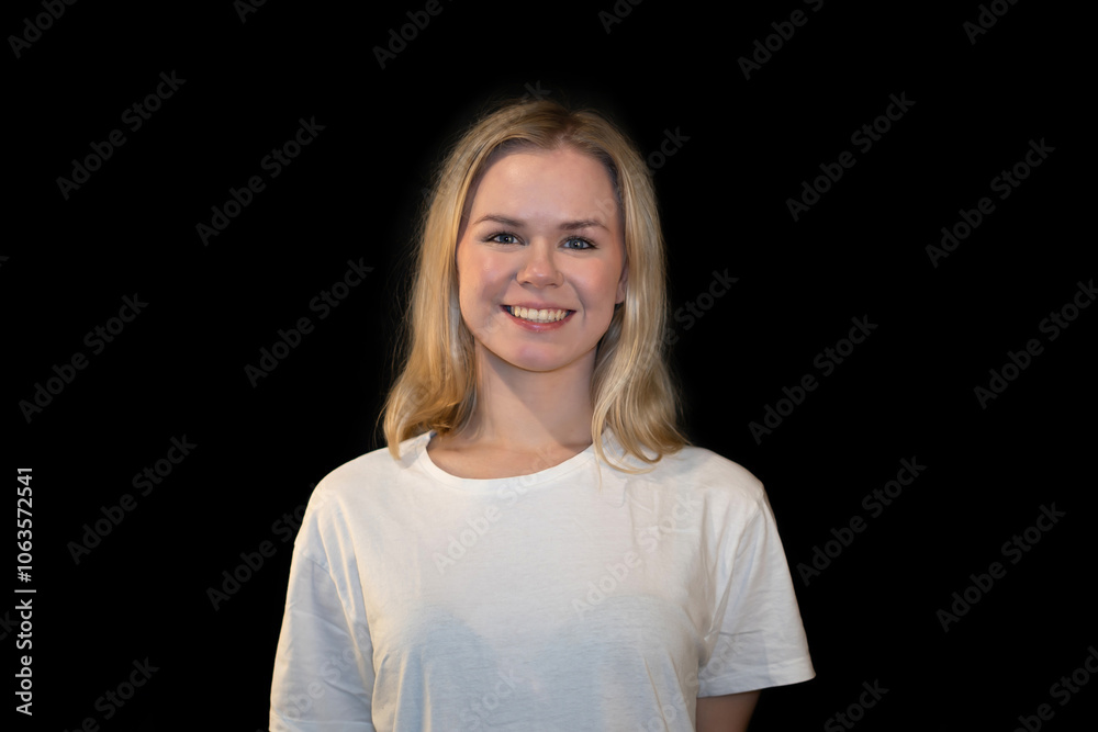Smiling Young Woman Standing with a Friendly Expression Smiling Young Woman Standing with a Friendly Expression