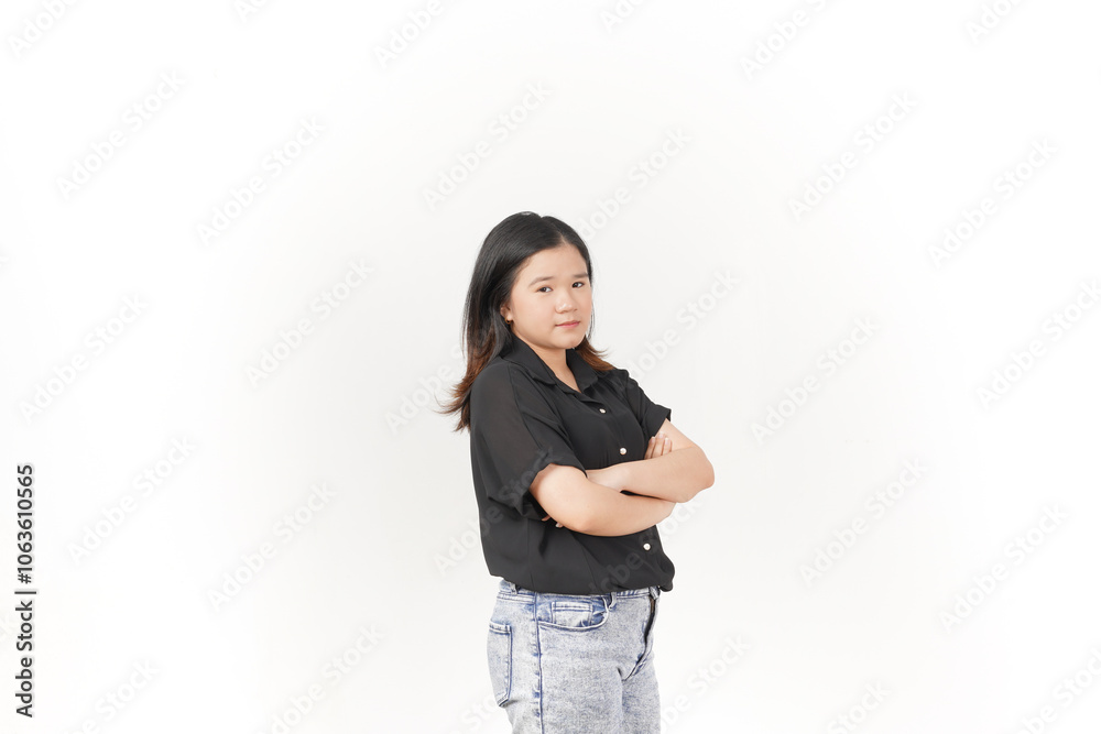 beautiful Asian woman stands with her arms folded across her chest, exuding confidence against a white background