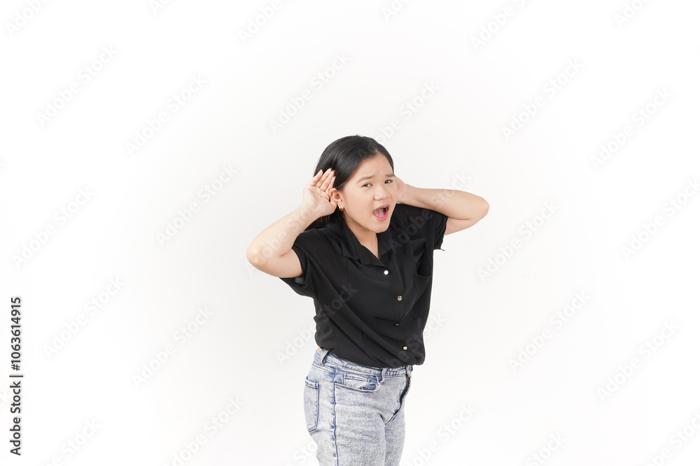 beautiful Asian woman poses with her hands on both ears, trying to listen attentively against a white background