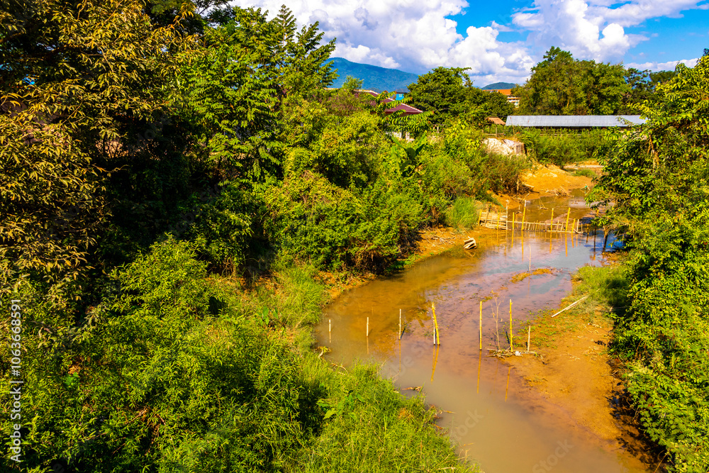 Mountain landscape with river lake water in Vang Vieng Laos. Mountain landscape with river lake water in Vang Vieng Laos.