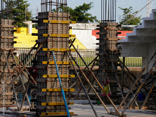 New construction site with beam frame to prepare reinforced concrete columns, foundation work and concrete pouring. Construction industry.