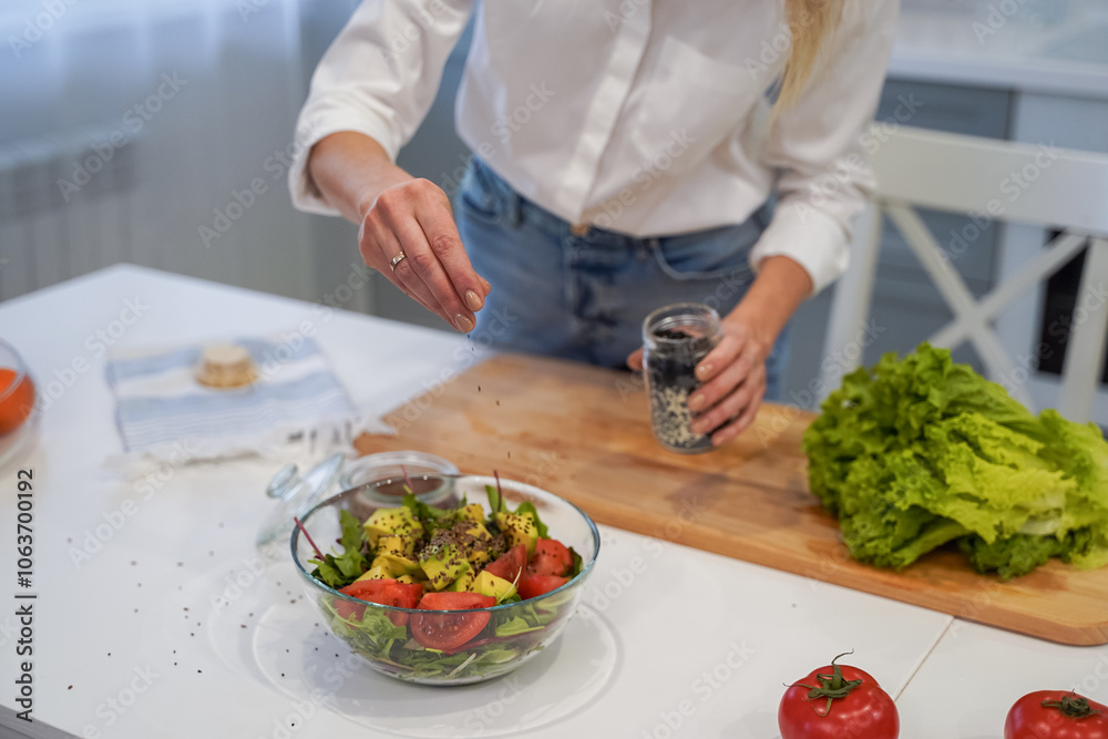 Cooking concept. Woman hands making healthy dinner, cutting vegetables on chopping board, kitchen interior, closeup