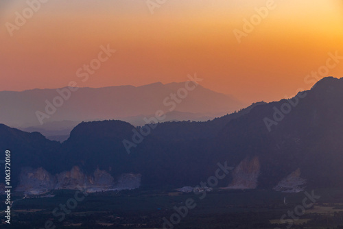 Mountain landscape with amazing colorful sunset in Vang Vieng Laos. photo