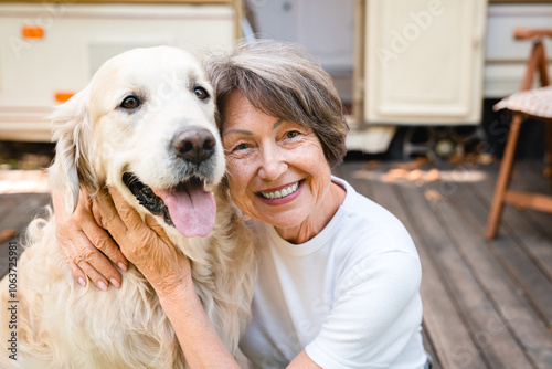 Closeup owner traveling caravanning with domestic animal pet golden retriever labrador photo