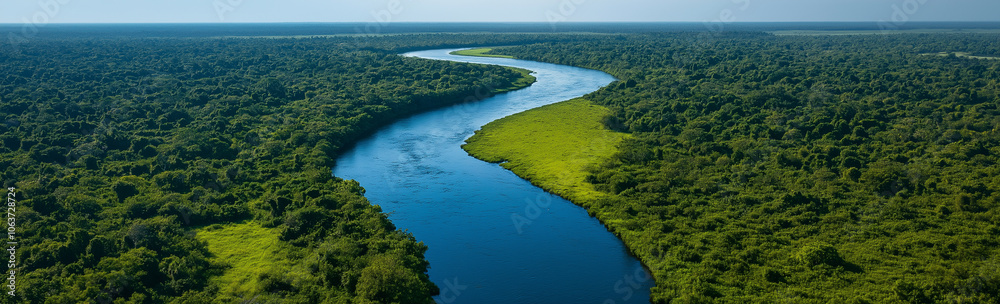 Aerial View Of A River Winding Through The Jungle In Bali: A Stunning Perspective Of A Serpentine River Meandering Amidst Lush Tropical Greenery And Dense Canopy, Showcasing The Untamed Beauty Of The Aerial View Of A River Winding Through The Jungle In Bali: A Stunning Perspective Of A Serpentine River Meandering Amidst Lush Tropical Greenery And Dense Canopy, Showcasing The Untamed Beauty Of The