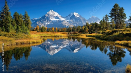 A picturesque mountain lake with snow-capped peaks reflected in the crystal-clear water, surrounded by lush green trees and golden autumn leaves.