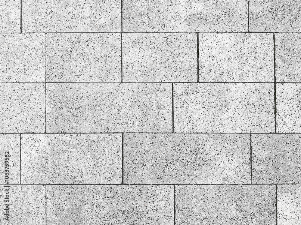 Fototapeta premium Stone pavement tiles texture background.