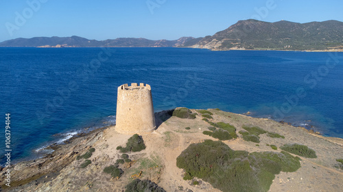 Piscinni or Pisxinni beach and Spanish tower in Teulada in southern Sardinia. photo