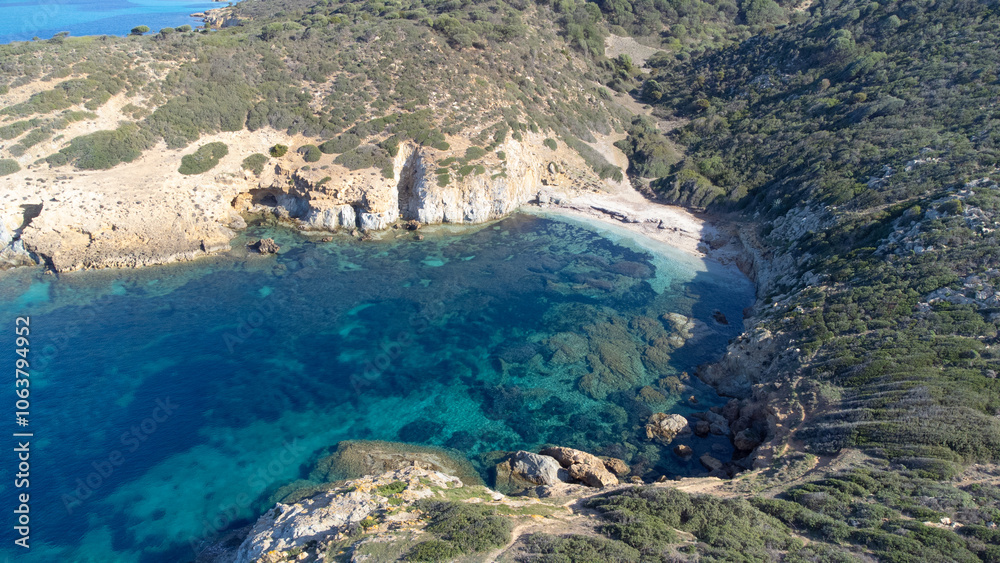 Obraz premium Piscinni or Pisxinni beach and Spanish tower in Teulada in southern Sardinia.