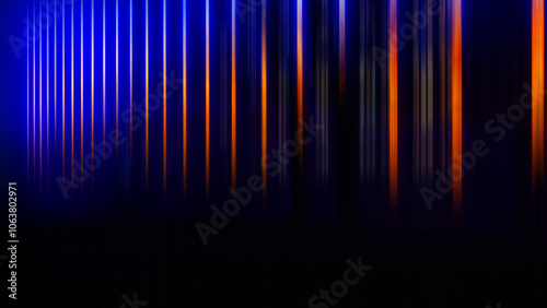 Abstract blurred background - vertical parallel color stripes orange, light, blue on black.