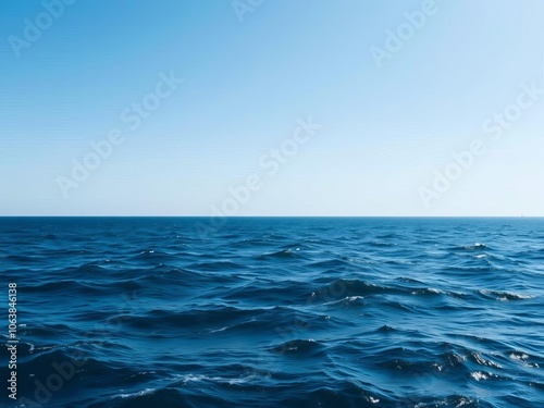Wallpaper Mural A vast expanse of deep blue water stretching to the horizon with gentle waves and a clear sky above, creating a sense of tranquility and freedom, freedom, nature Torontodigital.ca