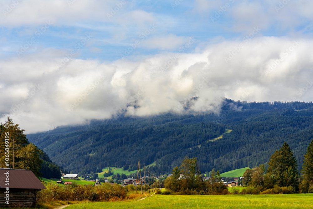 Fototapeta premium Foggy Mountain Landscape. European Alps. Austria