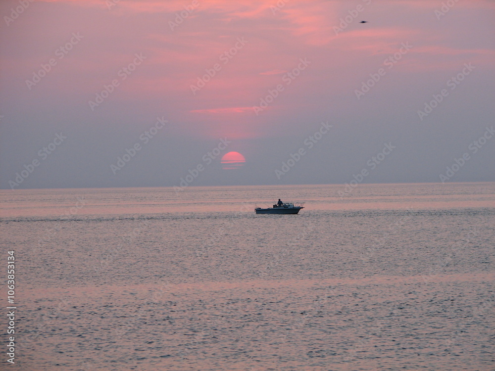 Fototapeta premium Sunset over the Atlantic Ocean