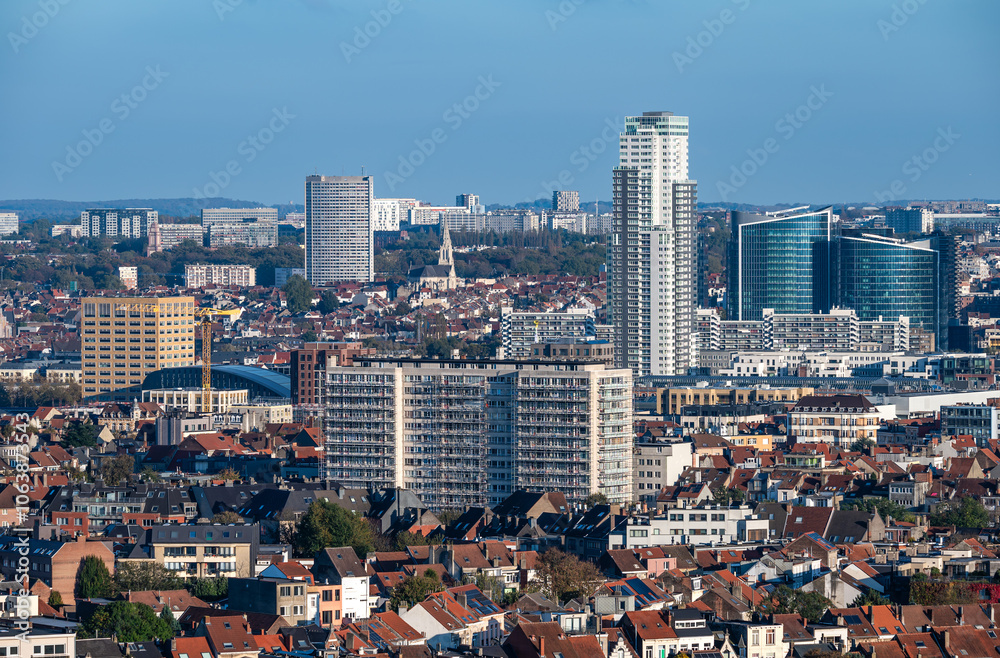 Obraz premium The Brussels skyline with the Up Site tower and residential apartment blocks in Koekelberg, Brussels Capital Region, Belgium, OCT 24, 2024