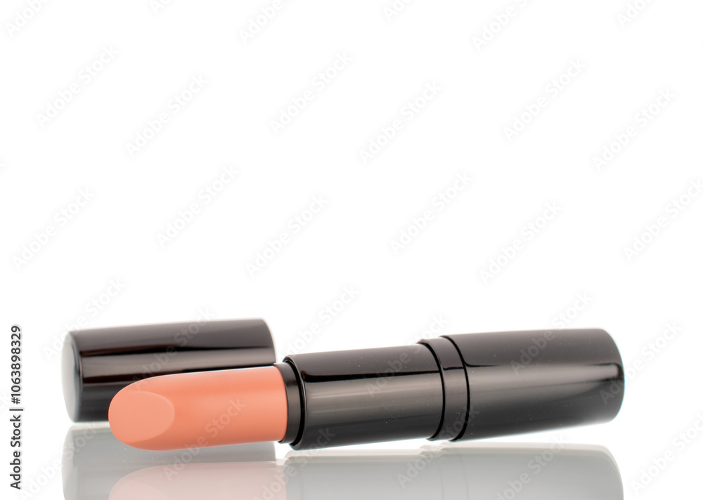 One cosmetic lipstick, macro, isolated on white background. One cosmetic lipstick, macro, isolated on white background.