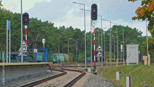 Railway Station Infrastructure with Passenger Platform Semaphore Lights Junction Switch Equipment and Traffic Caution Signs