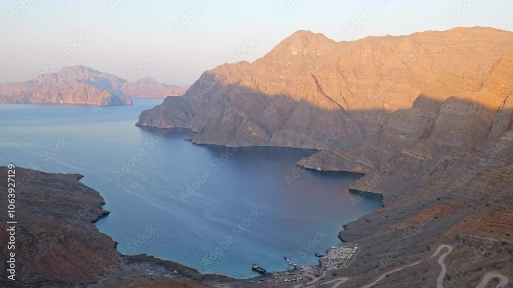 panoramic view of the Musandam fjords from a rocky cliff at sunset, Khor Najd, Oman panoramic view of the Musandam fjords from a rocky cliff at sunset, Khor Najd, Oman