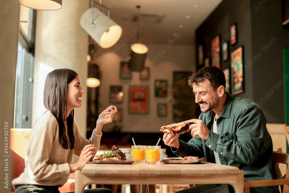 Enjoying a delightful brunch together at a cozy cafe on a sunny afternoon in the heart of the city Enjoying a delightful brunch together at a cozy cafe on a sunny afternoon in the heart of the city