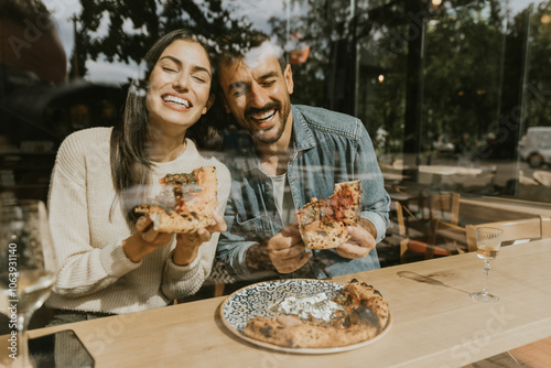 Enjoying delicious pizza to...